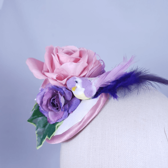 Fascinator rond avec oiseau