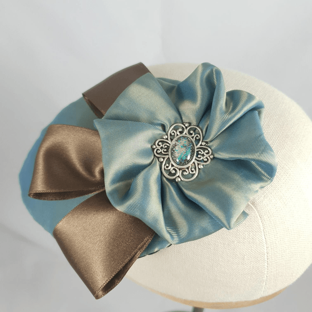 Fascinator goutte pétrole à cocarde